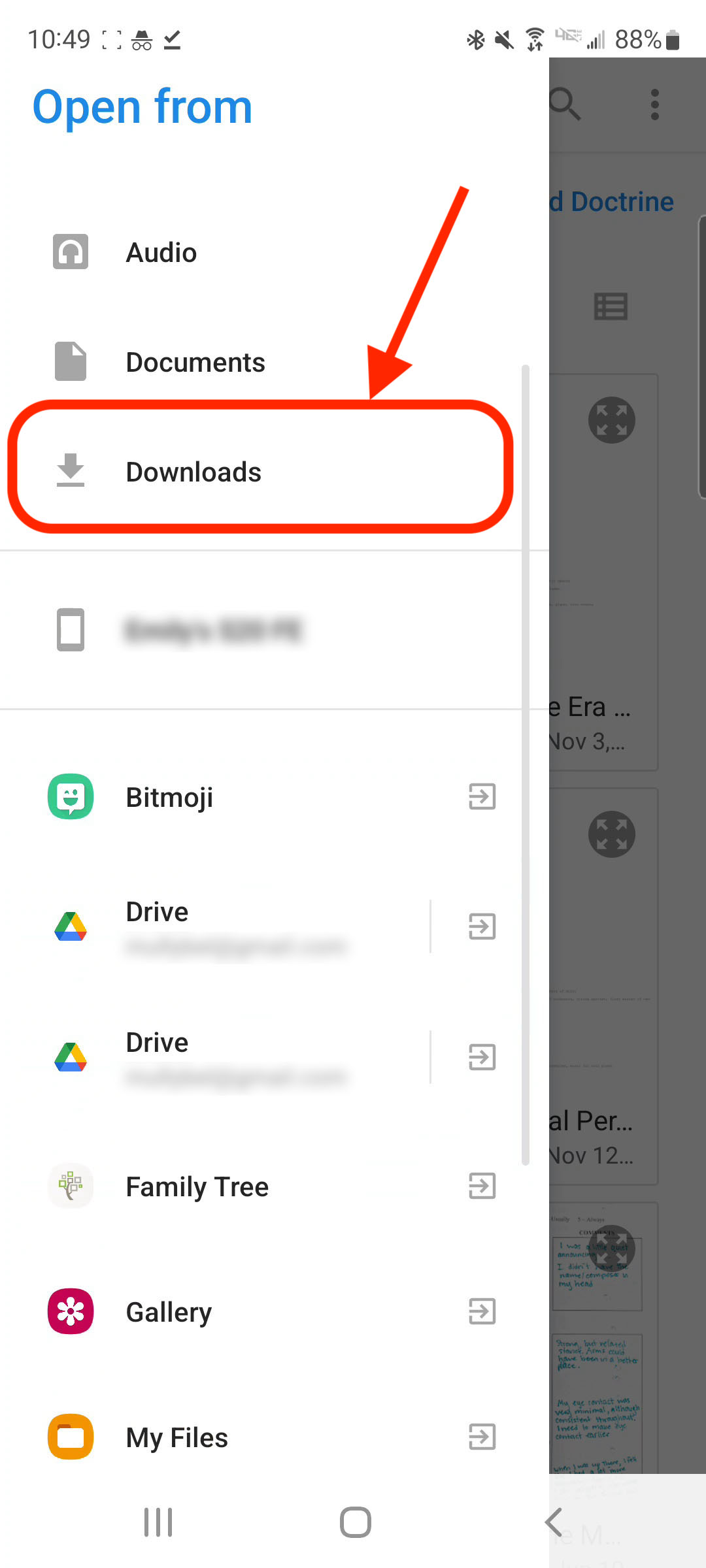A menu will appear on the left side of the screen. Tap Downloads