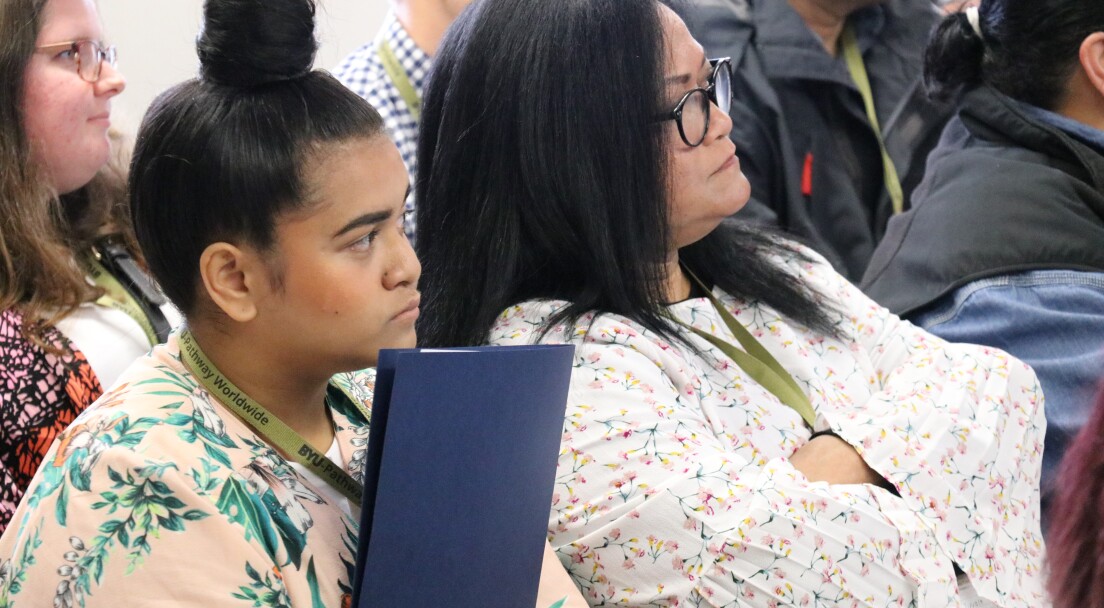 women listening in a meeting