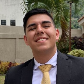 Aaron smiles with gratitude for the opportunity to keep progressing.