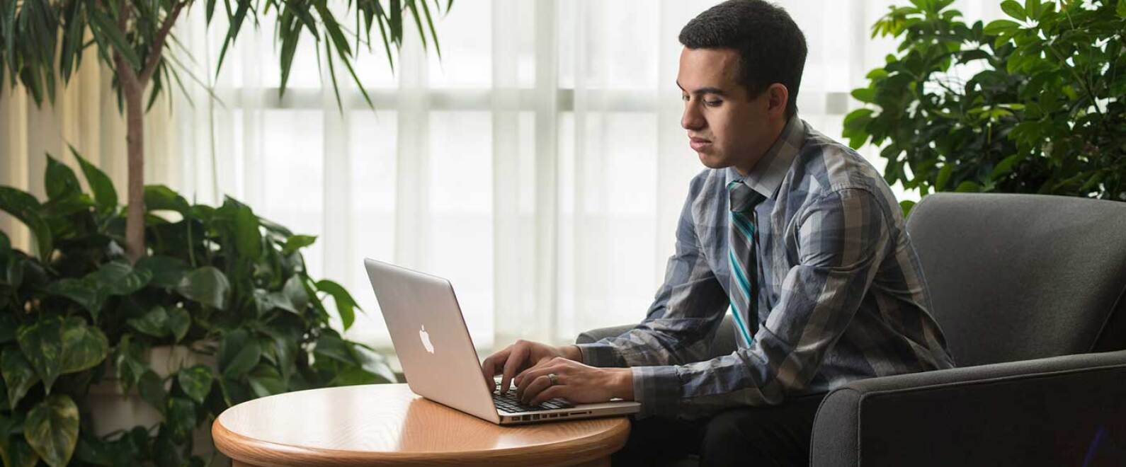 Male student with laptop