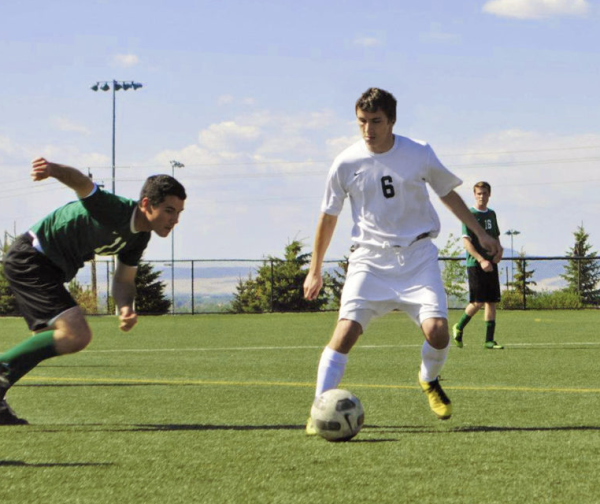 boys playing soccer