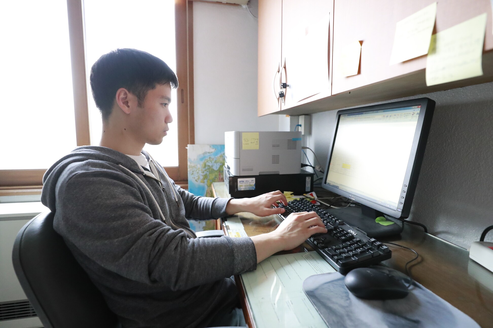 High School boy on computer