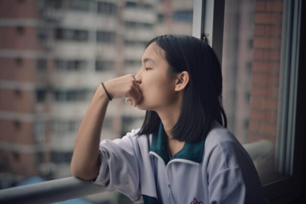 lady looking out of a window