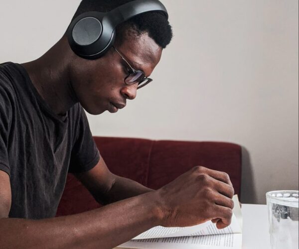 man studying with headphones on