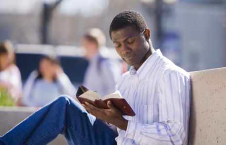 boy studying the word of god